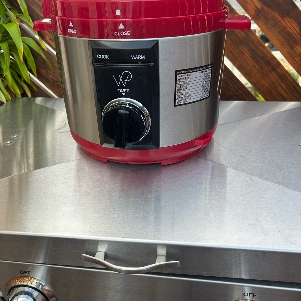 Red and Silver Cookware Electric Pressure Cooker